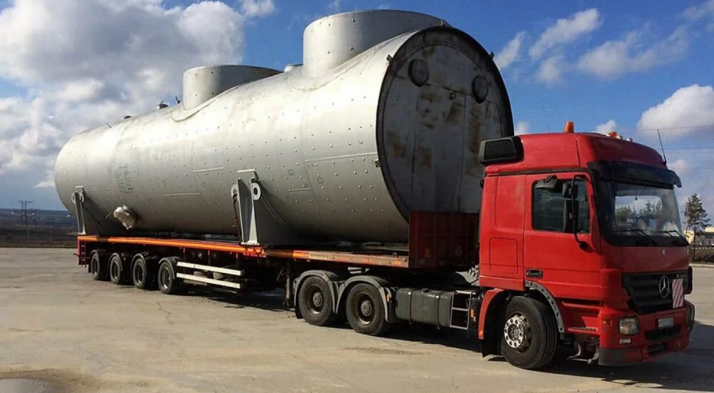 Перевозка негабаритных емкостей и цистерн на трале стоимость услуг и где заказать - Зверево